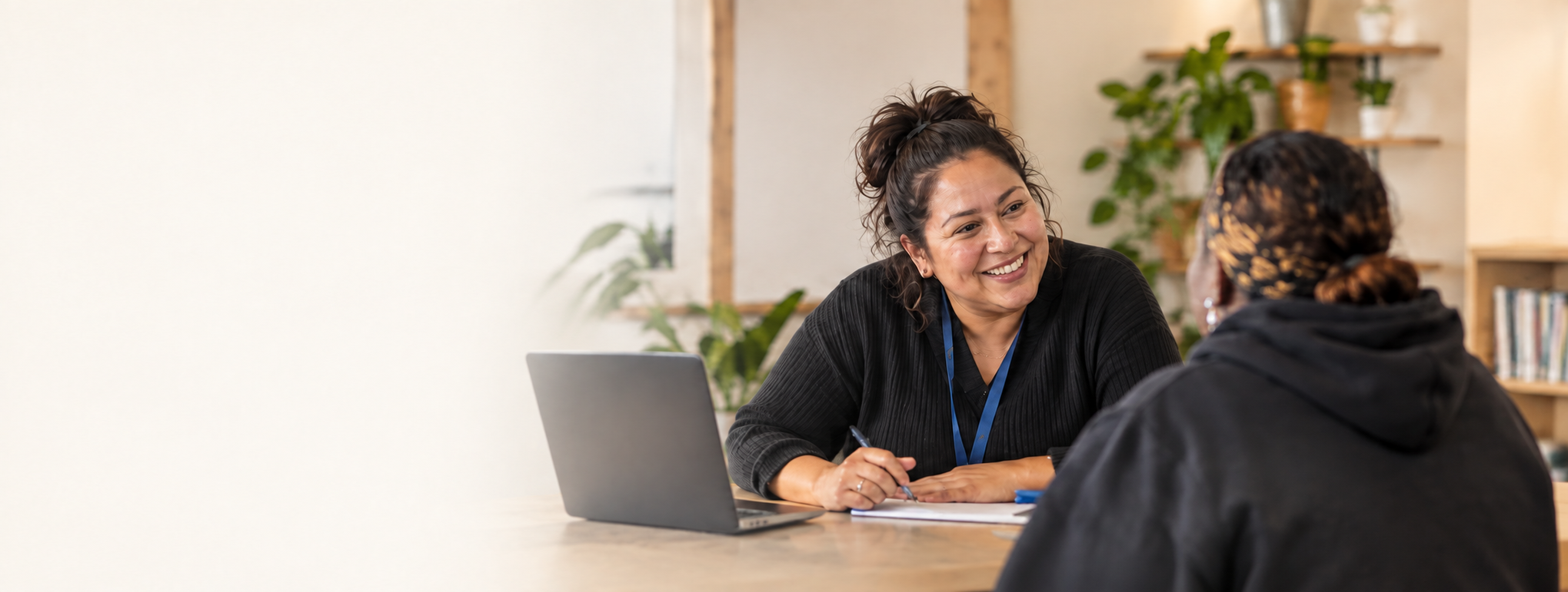 A caseworker talking with a client